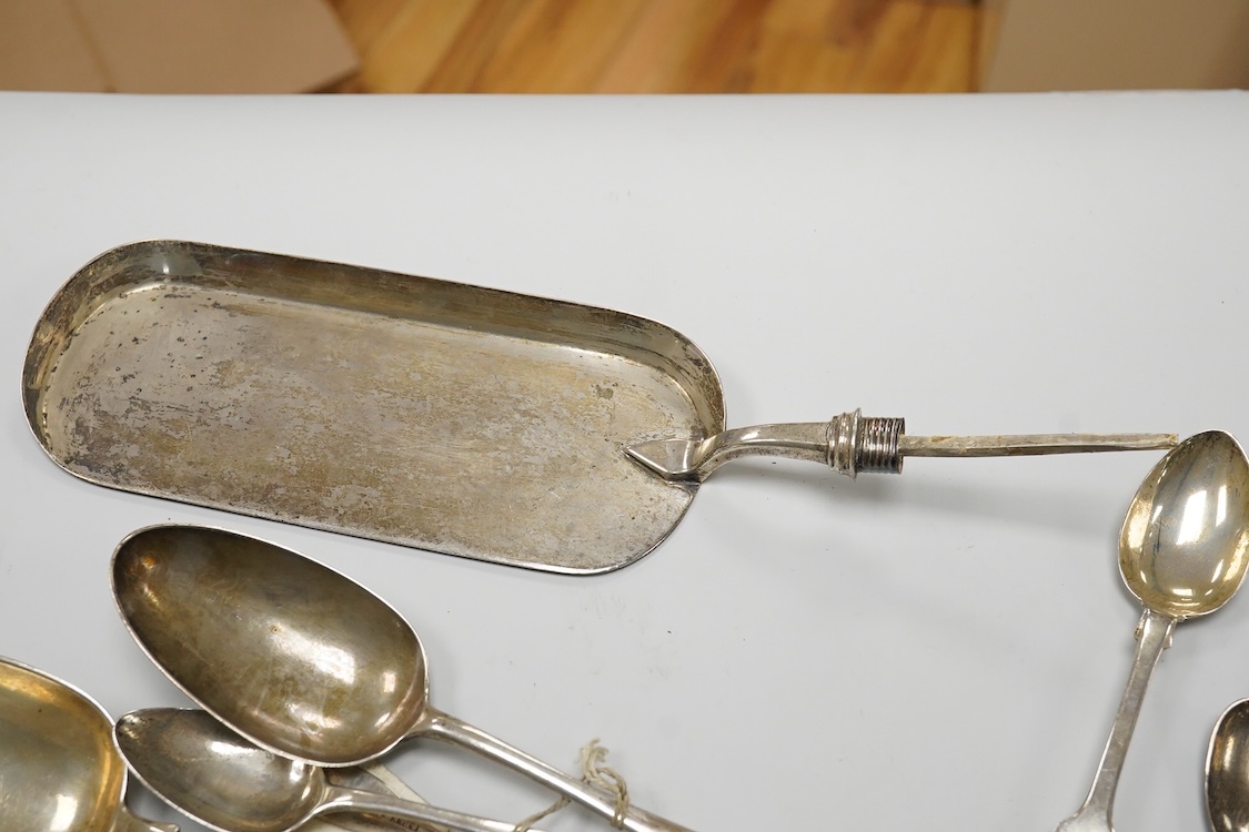 A small quantity of assorted mainly 19th century silver flatware including table spoons and teaspoons, various dates, patterns and makers, together with a silver crumb scoop(lacking handle), five 19th century Russian 94